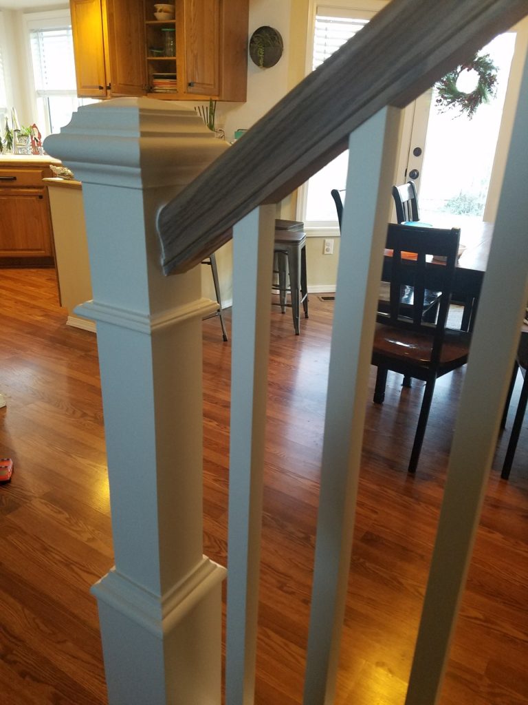 white and wood banister